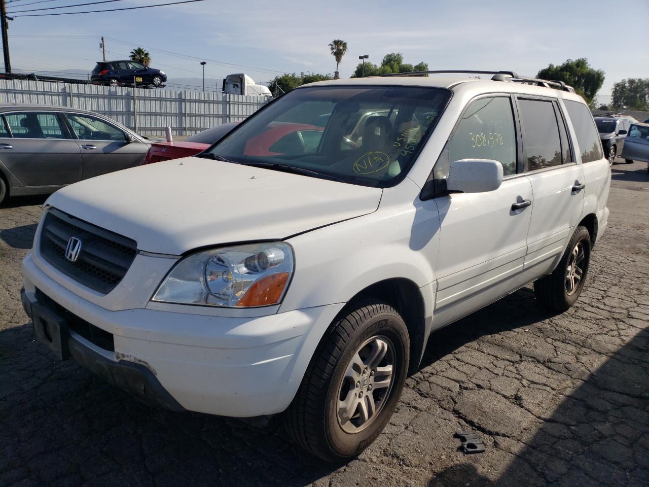 Photo 2 from auction – 2003 HONDA PILOT EX with VIN 2HKYF18463H552897