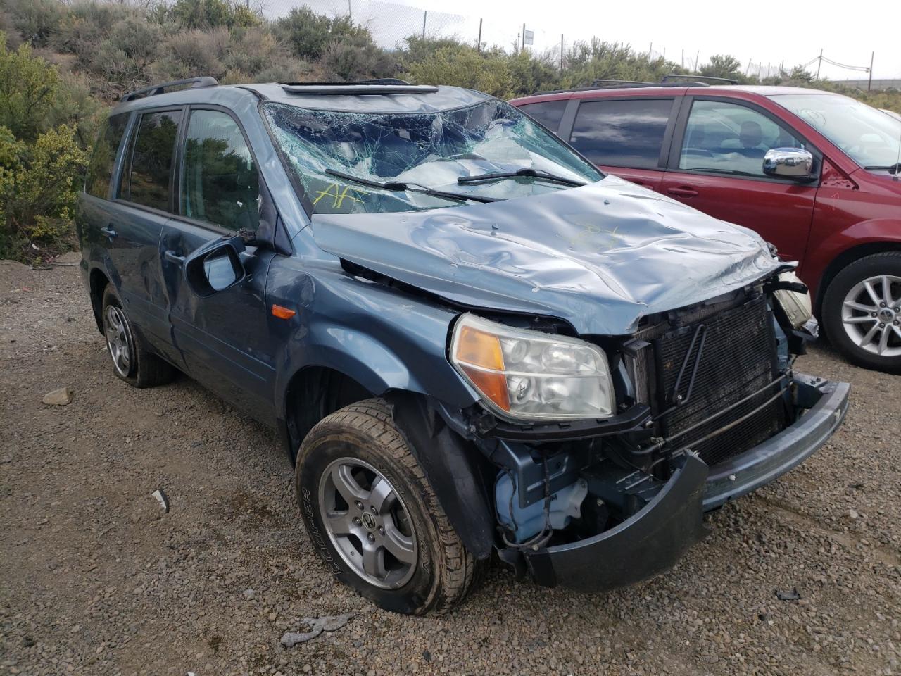 Photo 14 from auction – 2006 HONDA PILOT EX with VIN 2HKYF18526H553803