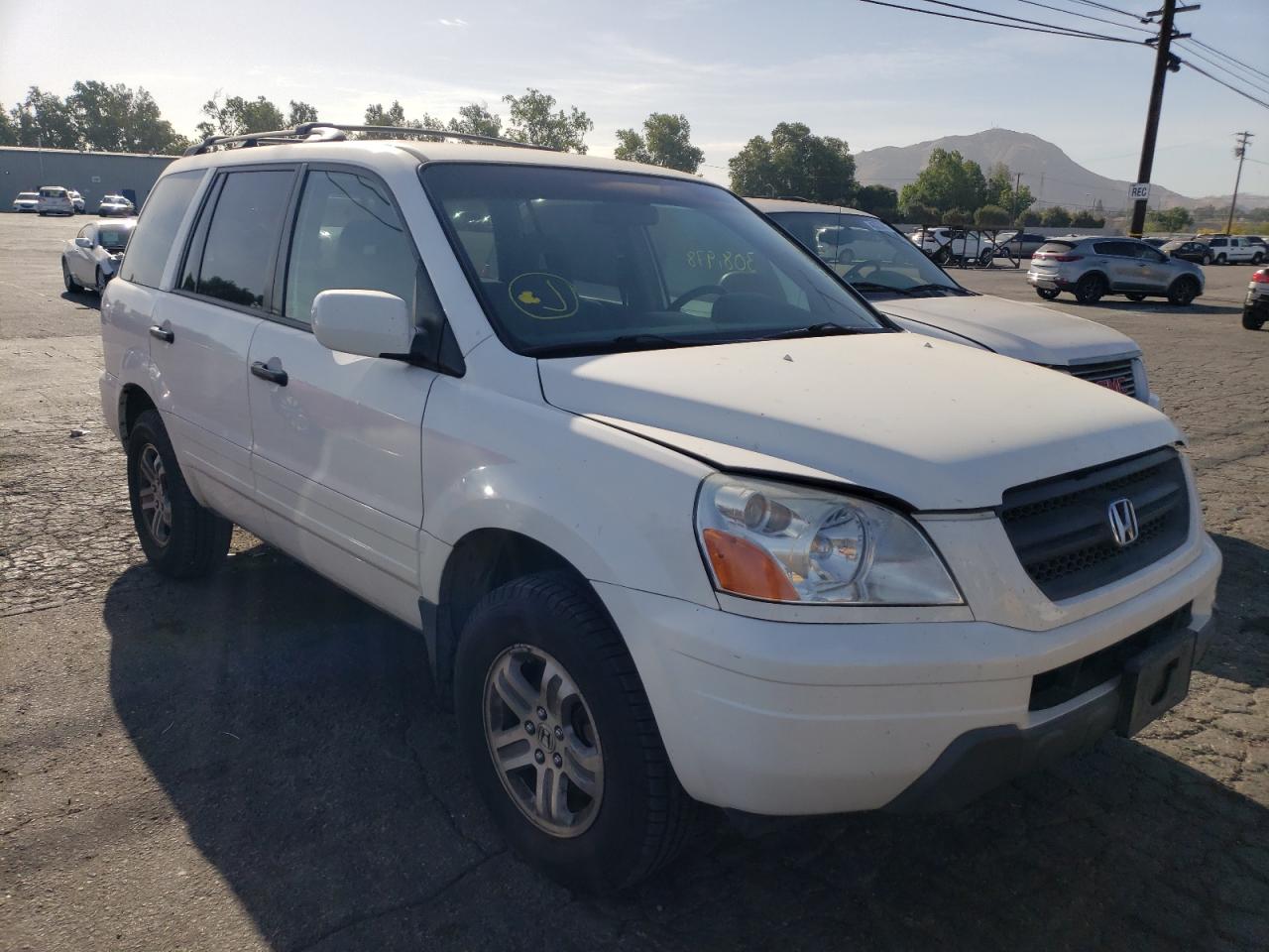 HONDA PILOT EX 2003 with VIN 2HKYF18463H552897 - Photo from auction