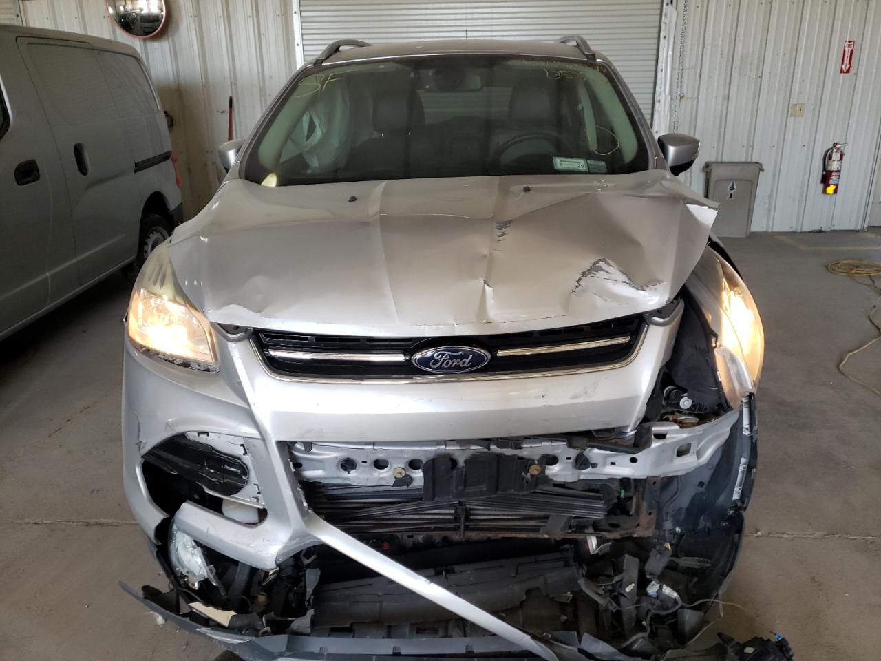 Photo 7 from auction – 2014 FORD ESCAPE TIT with VIN 1FMCU9JX6EUB53902