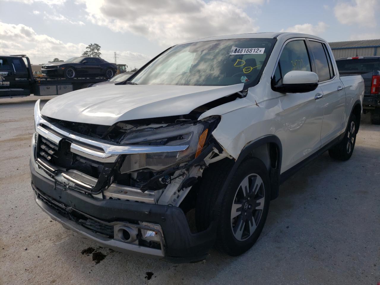 Photo 2 from auction – 2017 HONDA RIDGELINE with VIN 5FPYK3F72HB011198
