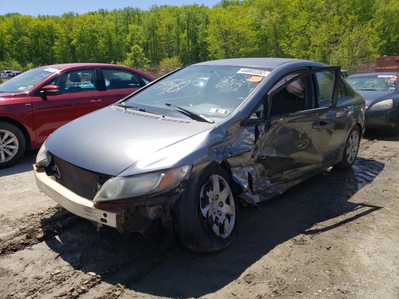 Photo 2 from auction – 2010 HONDA CIVIC LX with VIN 19XFA1F57AE021193