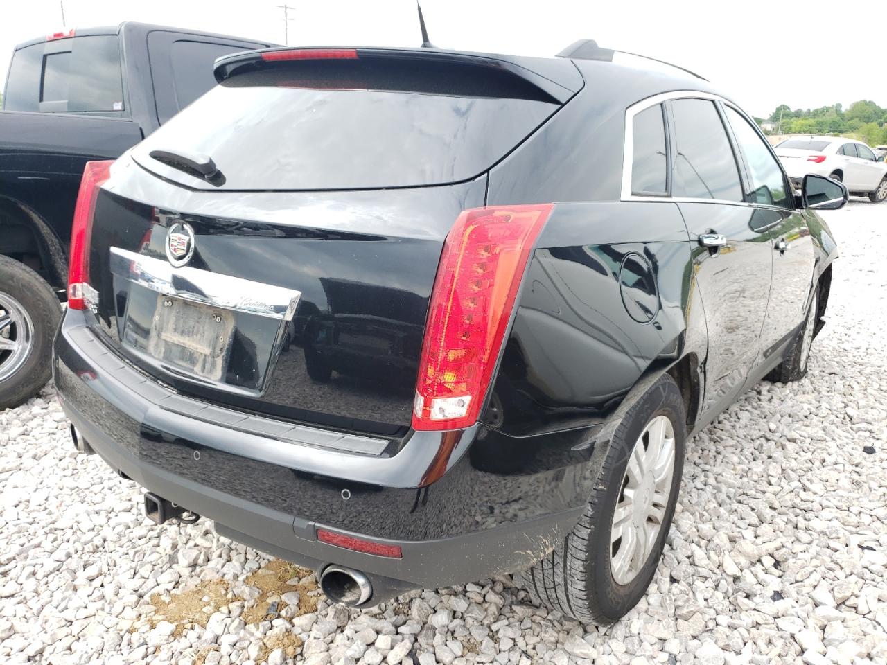 Photo 4 from auction – 2011 CADILLAC SRX LUXURY with VIN 3GYFNAEY9BS628516