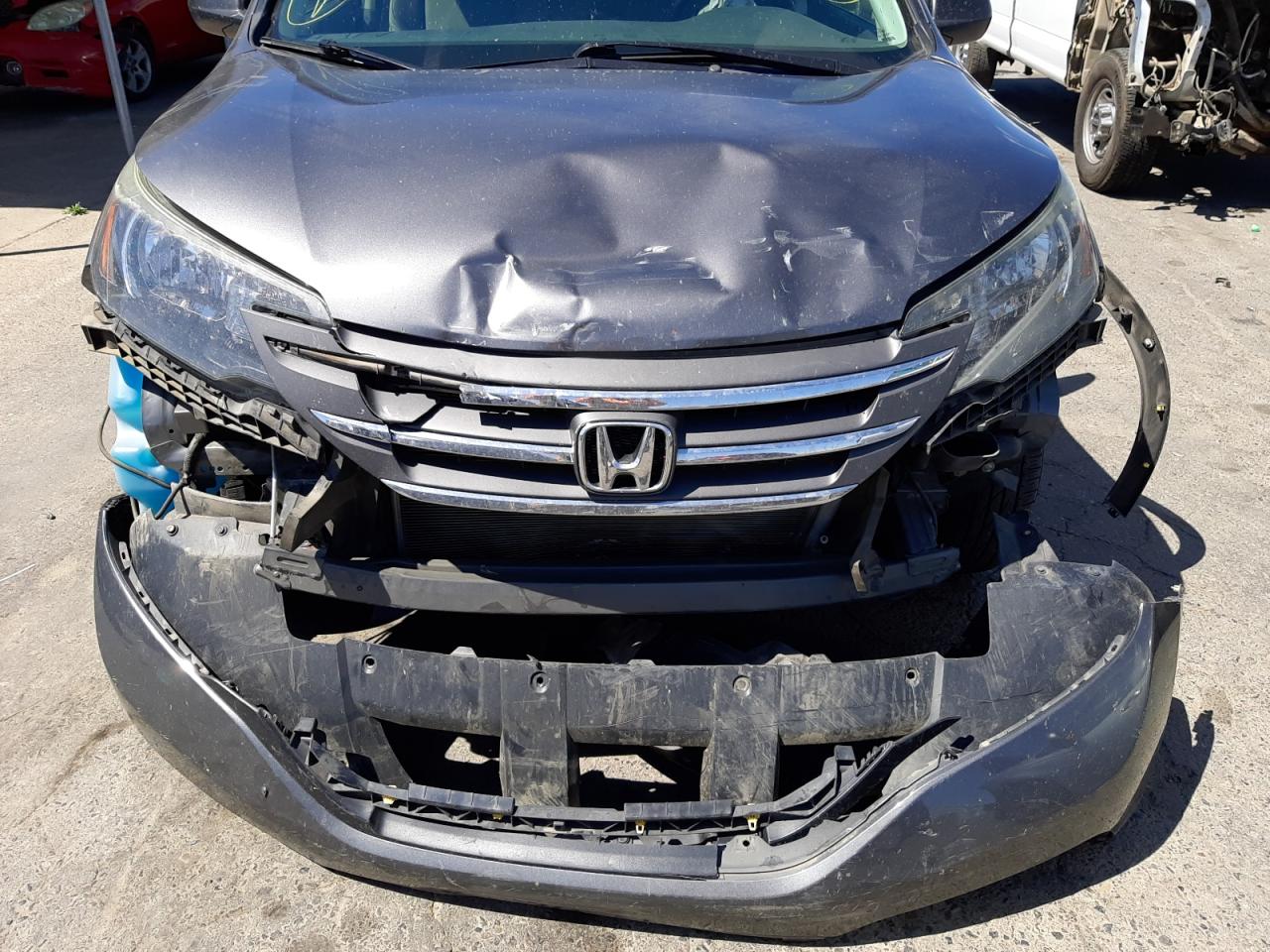 Photo 9 from auction – 2013 HONDA CR-V LX with VIN 2HKRM4H37DH693210