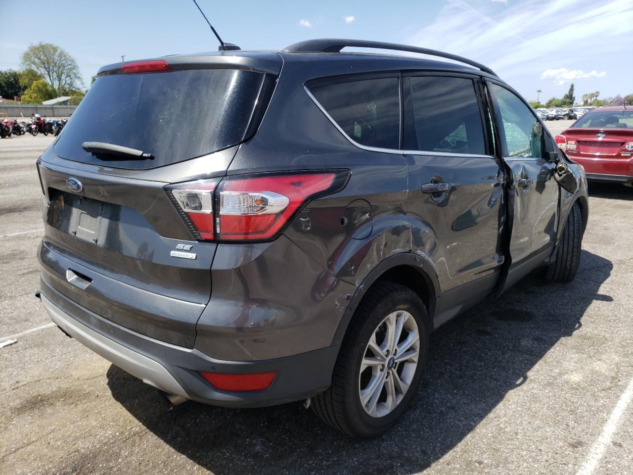 Photo 4 from auction – 2018 FORD ESCAPE SE with VIN 1FMCU0GD2JUC90824
