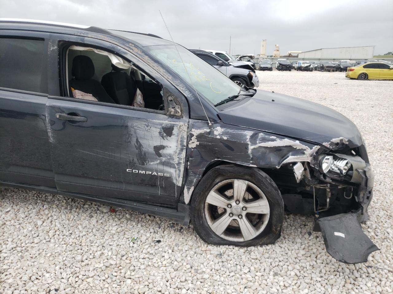 Photo 9 from auction – 2014 JEEP COMPASS SP with VIN 1C4NJCBA3ED642755