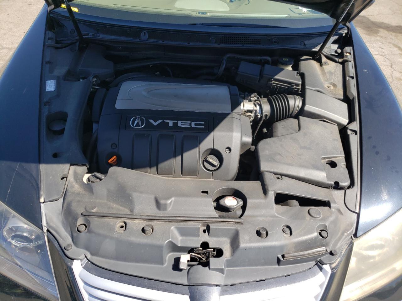 Photo 7 from auction – 2005 ACURA RL with VIN JH4KB16565C001802