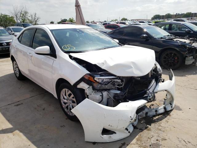 TOYOTA COROLLA L 2017 with VIN 5YFBURHE9HP597734 - Photo from auction