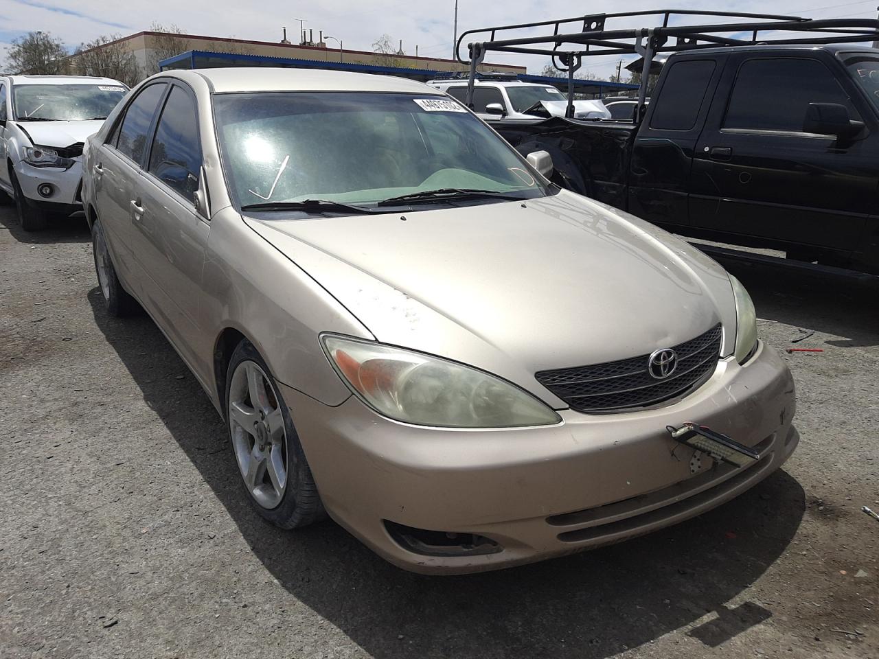 TOYOTA CAMRY LE 2002 with VIN 4T1BF32K92U522950 - Photo from auction