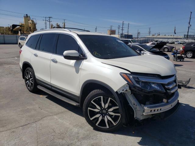 HONDA PILOT ELIT 2018 with VIN 5FNYF6H03JB002692 - Photo from auction