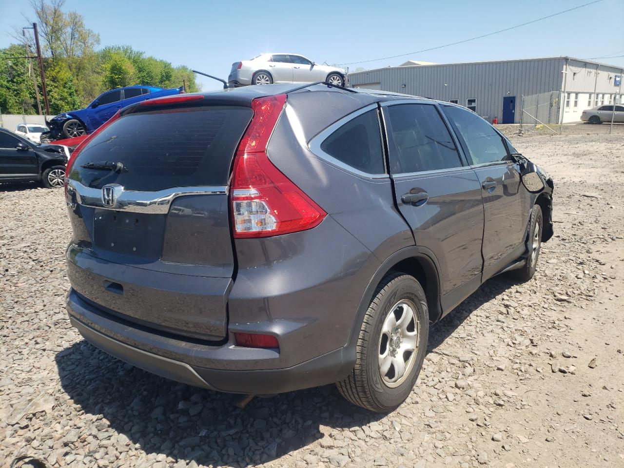 Photo 4 from auction – 2016 HONDA CR-V LX with VIN 3CZRM3H32GG705183