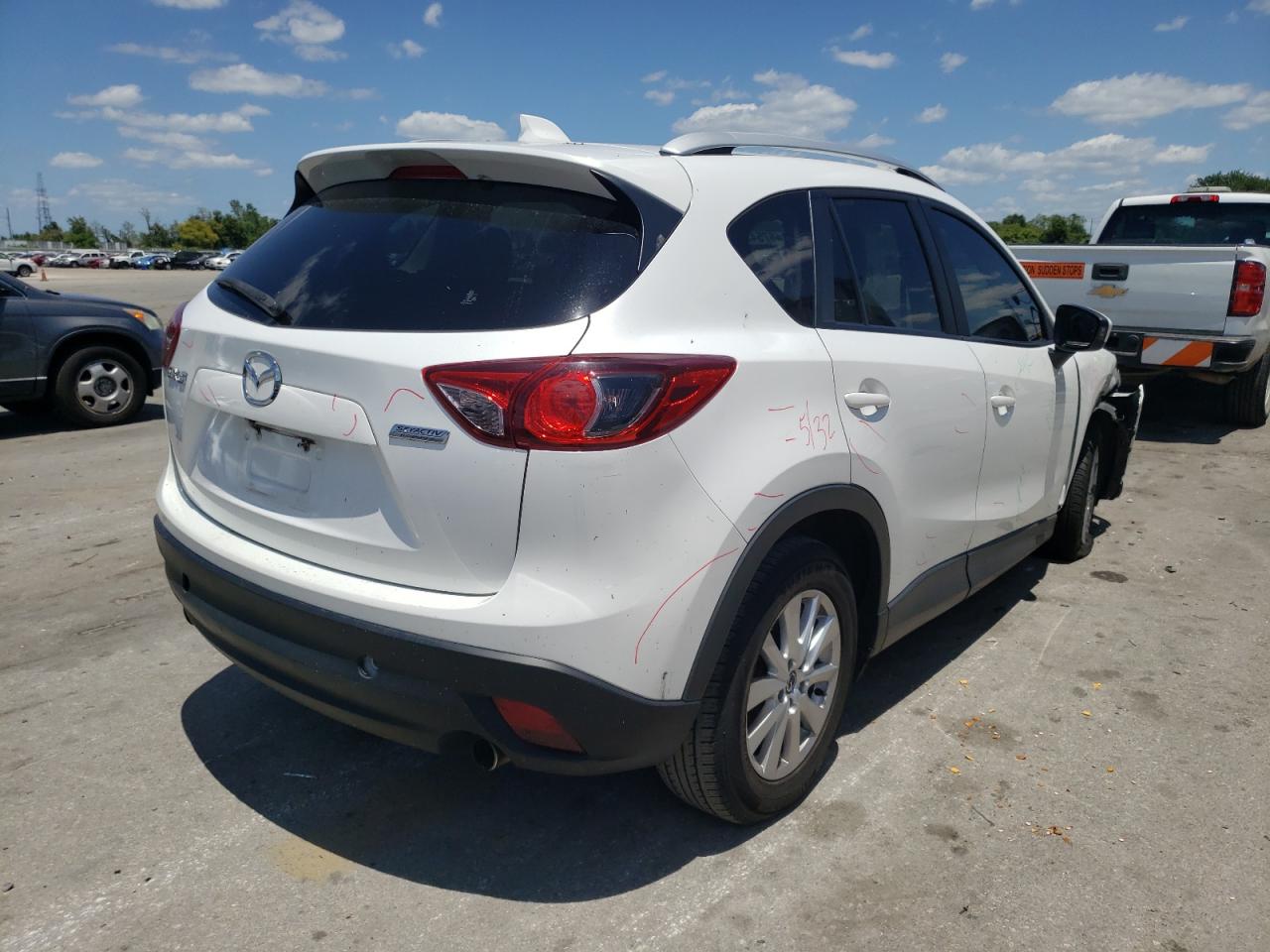 Photo 4 from auction – 2013 MAZDA CX-5 TOURI with VIN JM3KE2CE5D0158022