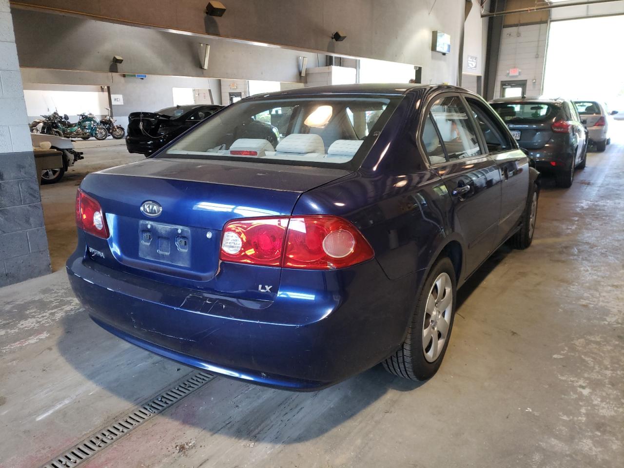 Photo 4 from auction – 2007 KIA OPTIMA LX with VIN KNAGE123675126337