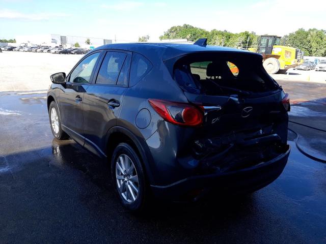 Photo 3 from auction – 2014 MAZDA CX-5 TOURI with VIN JM3KE2CYXE0386139