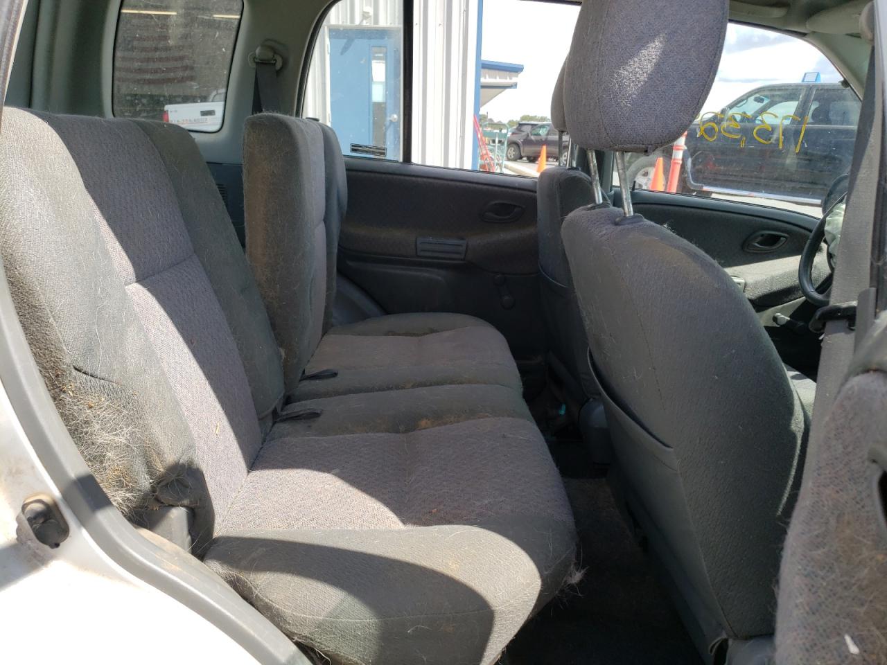 Photo 6 from auction – 1999 CHEVROLET TRACKER with VIN 2CNBJ13C1X6937485