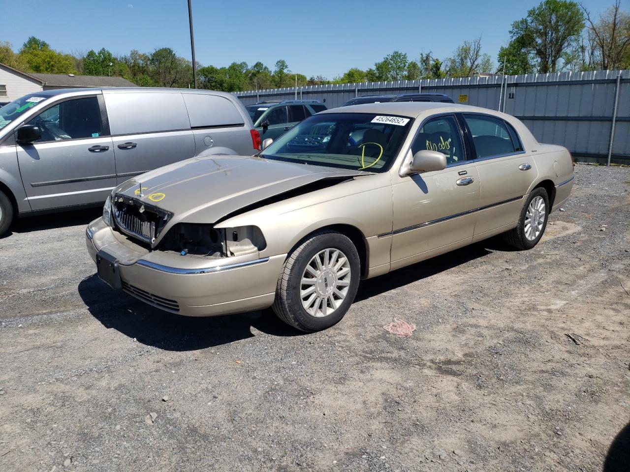 Photo 2 from auction – 2004 LINCOLN TOWN CAR E with VIN 1LNHM81W34Y614827