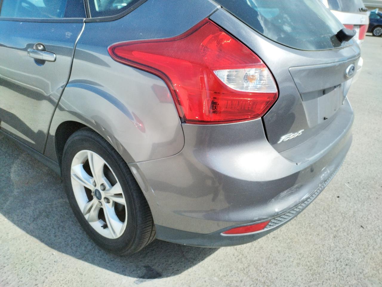 Photo 9 from auction – 2014 FORD FOCUS SE with VIN 1FADP3K21EL239629