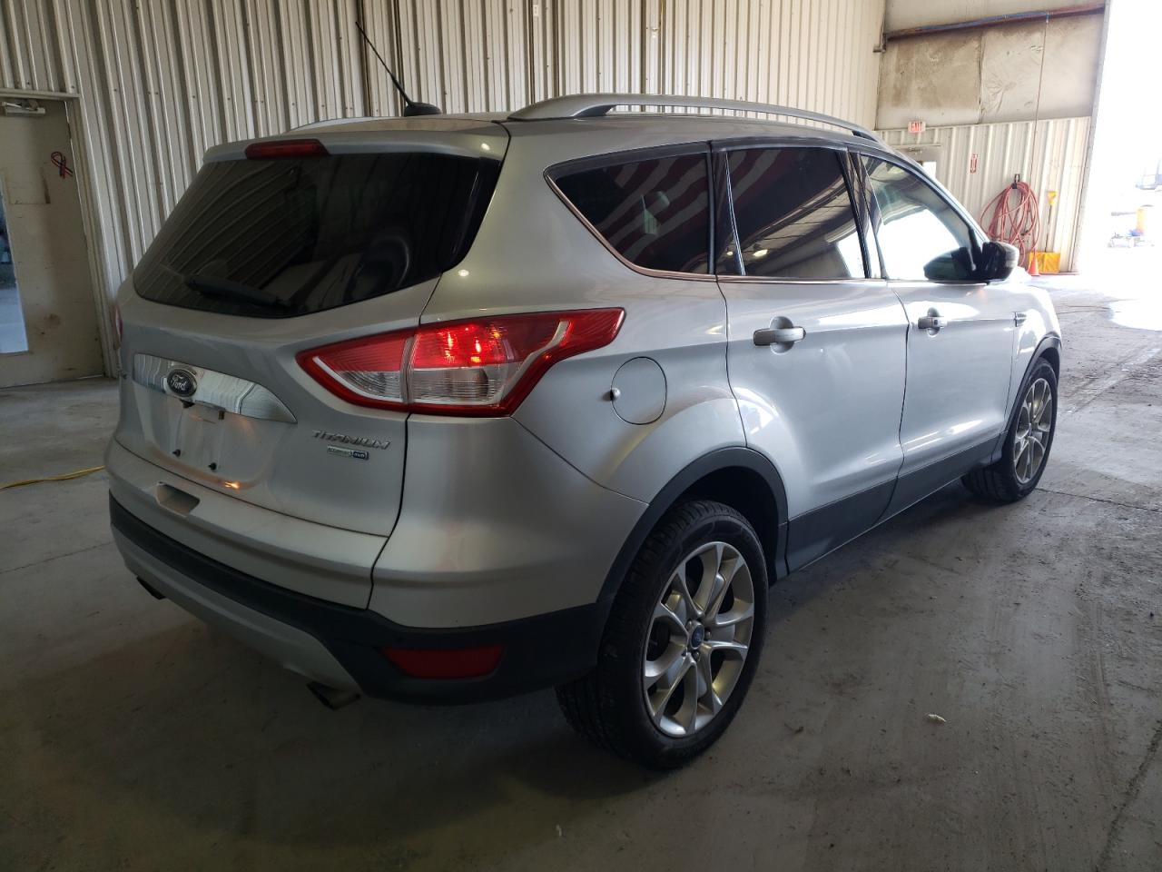 Photo 4 from auction – 2014 FORD ESCAPE TIT with VIN 1FMCU9JX6EUB53902