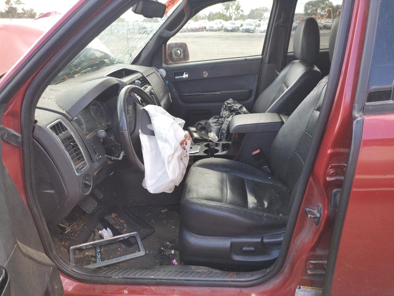 Photo 5 from auction – 2009 FORD ESCAPE LIM with VIN 1FMCU94G29KC03787