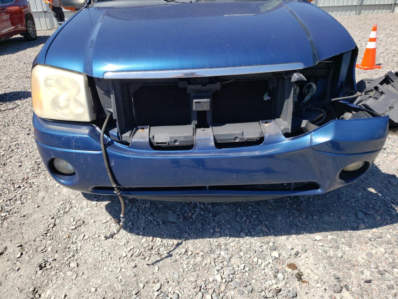 Photo 9 from auction – 2005 GMC ENVOY with VIN 1GKDS13S052259523