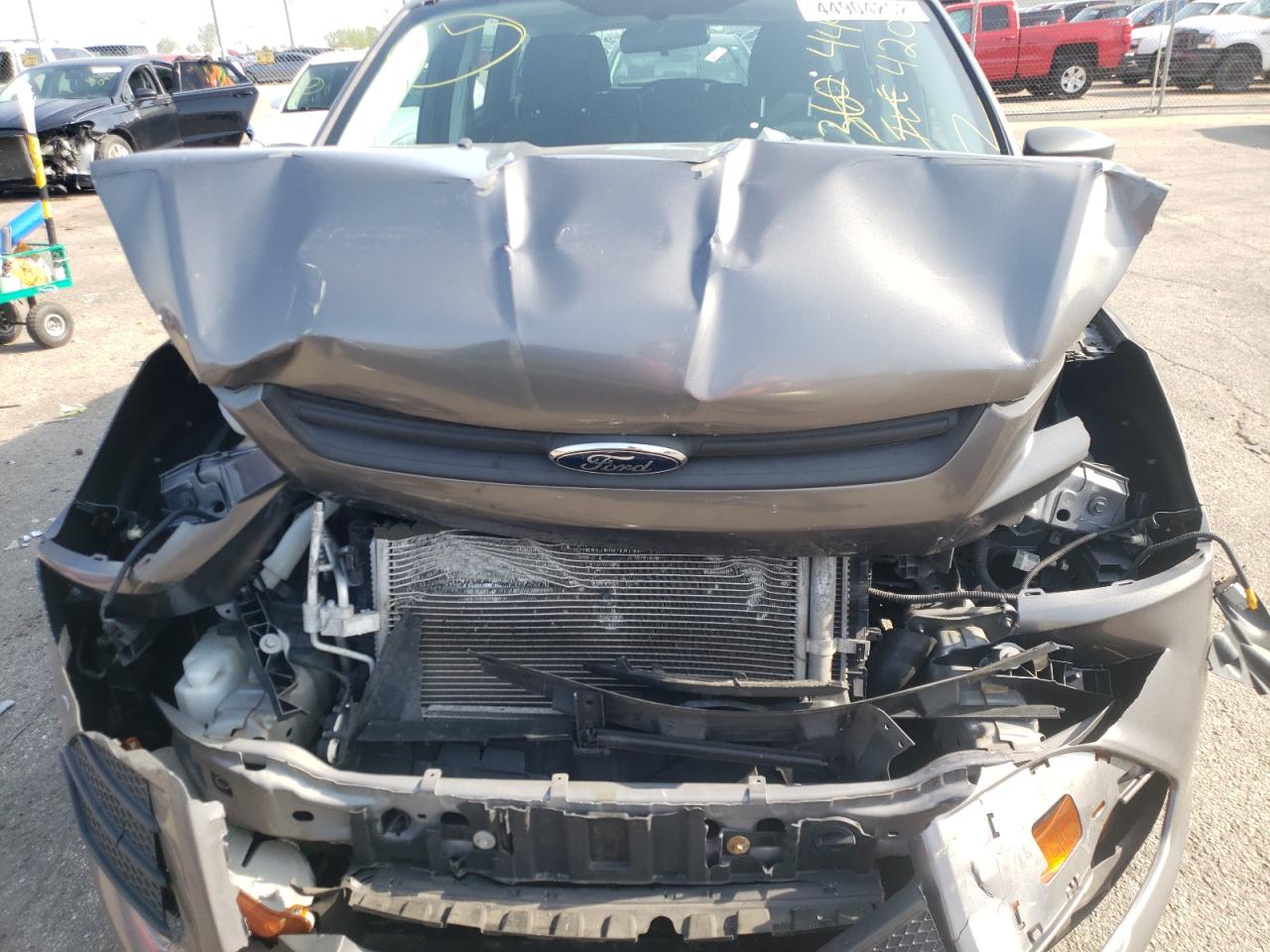 Photo 7 from auction – 2013 FORD ESCAPE S with VIN 1FMCU0F77DUA84933