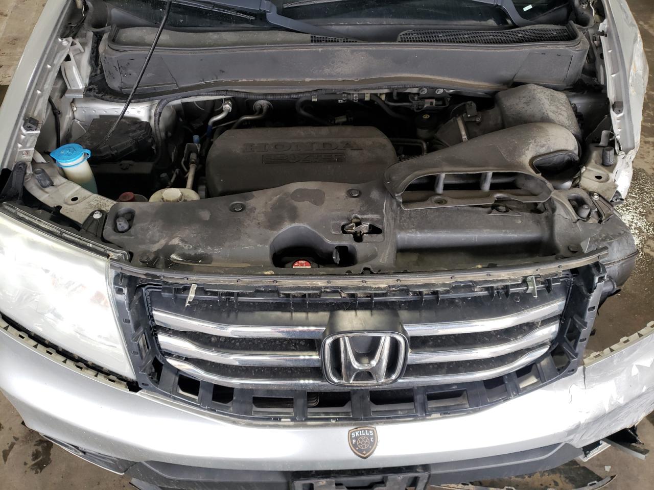 Фото 7 с аукциона – 2012 HONDA PILOT EXL с VIN 5FNYF4H61CB009748