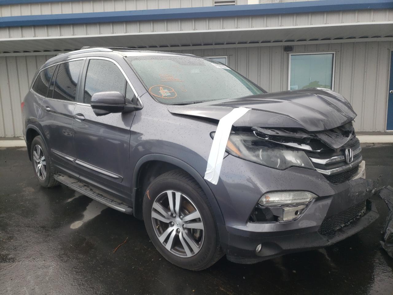 HONDA PILOT EXL 2017 with VIN 5FNYF5H52HB004000 - Photo from auction