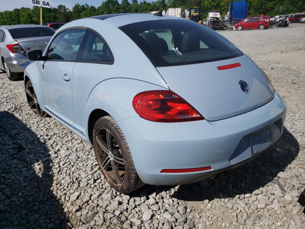 Photo 13 from auction – 2013 VOLKSWAGEN BEETLE with VIN 3VWJX7AT5DM660486
