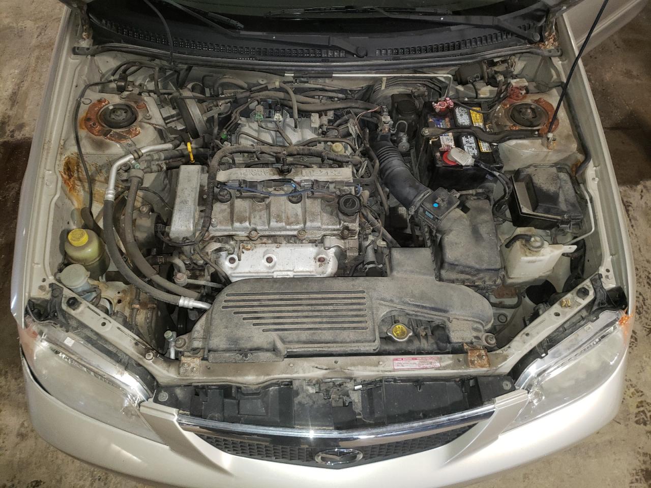 Photo 7 from auction – 2002 MAZDA PROTEGE DX with VIN JM1BJ226920510160