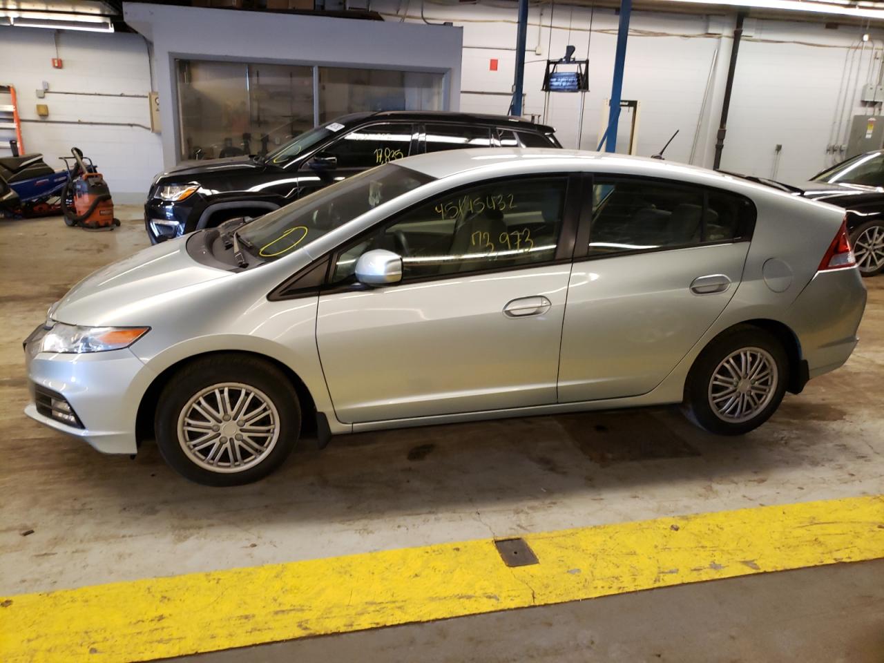 Photo 9 from auction – 2012 HONDA INSIGHT LX with VIN JHMZE2H54CS004144