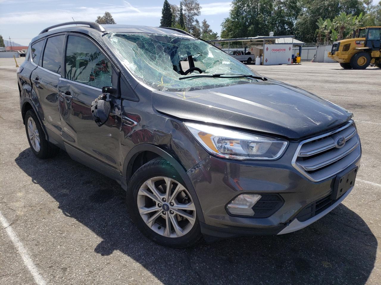 FORD ESCAPE SE 2018 with VIN 1FMCU0GD2JUC90824 - Photo from auction