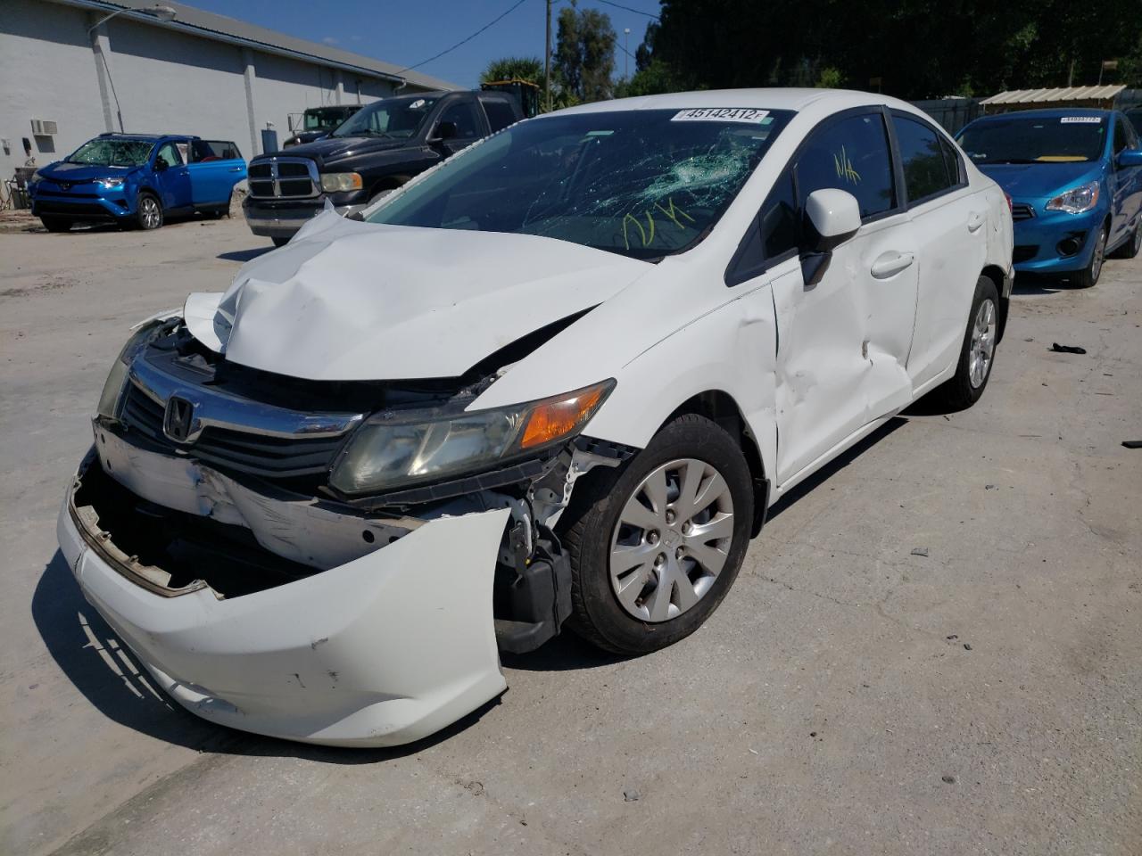 Photo 13 from auction – 2012 HONDA CIVIC LX with VIN 19XFB2F51CE100672