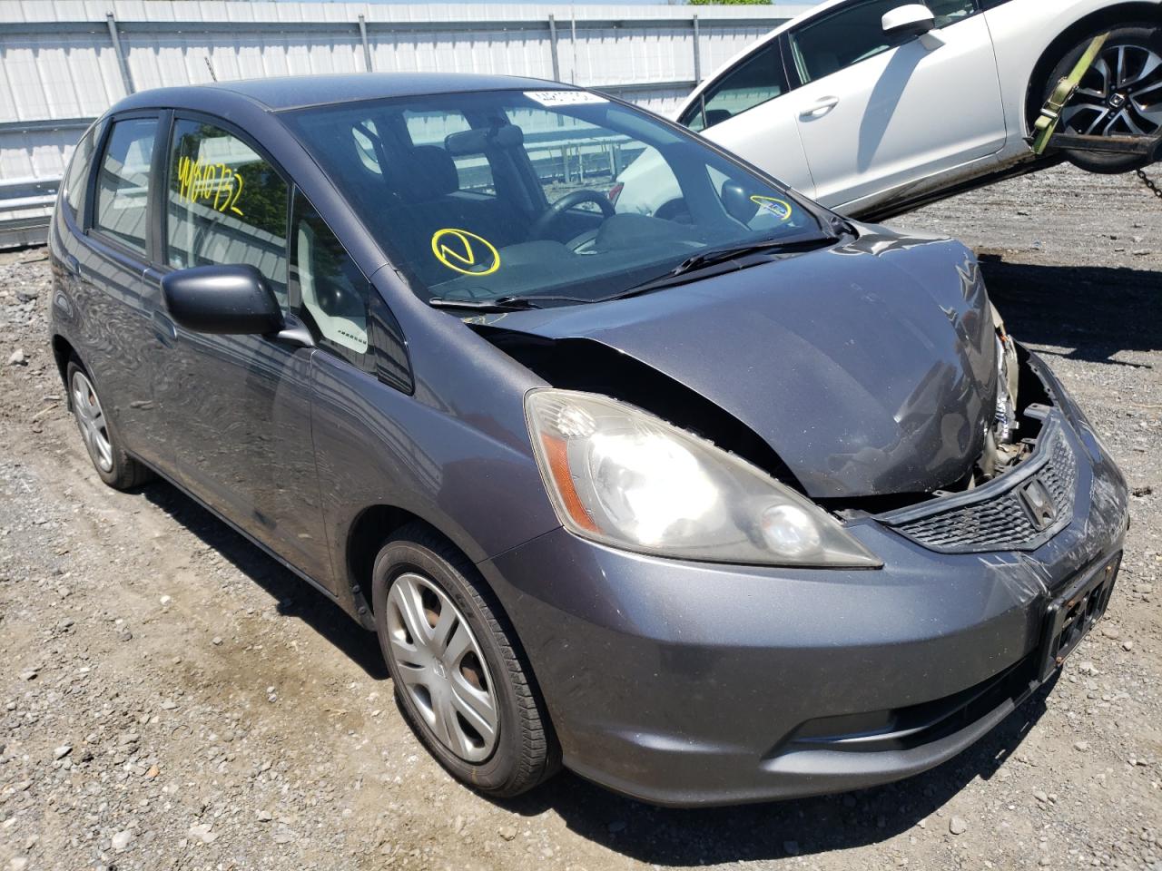 HONDA FIT 2011 with VIN JHMGE8H32BC028735 - Photo from auction