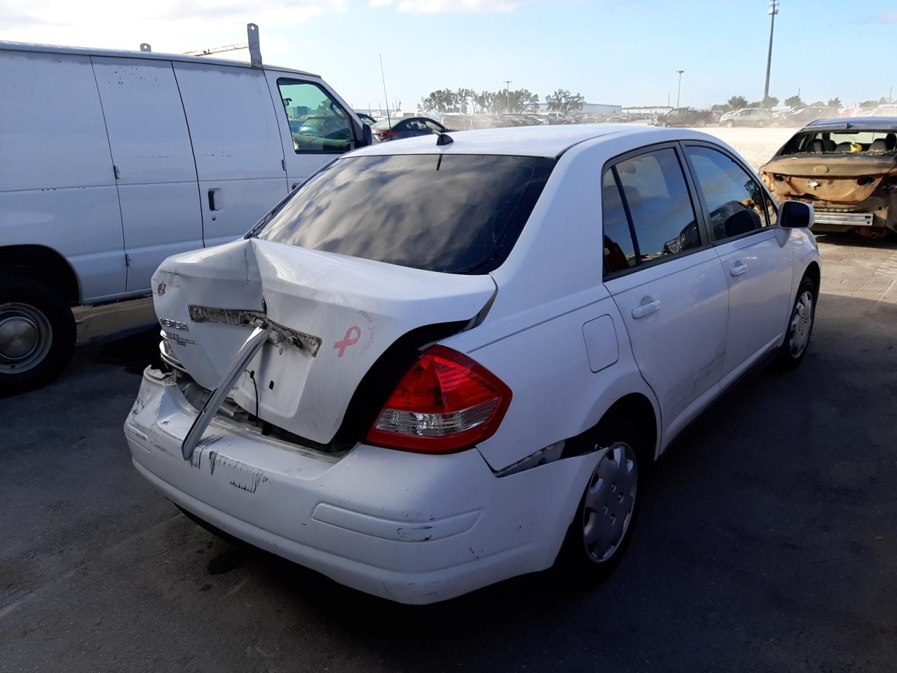 Photo 4 from auction – 2009 NISSAN VERSA S with VIN 3N1BC11E79L409535