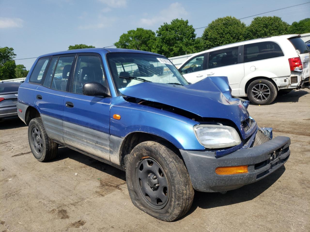 TOYOTA RAV4 1997 with VIN JT3GP10VXV7013059 - Photo from auction