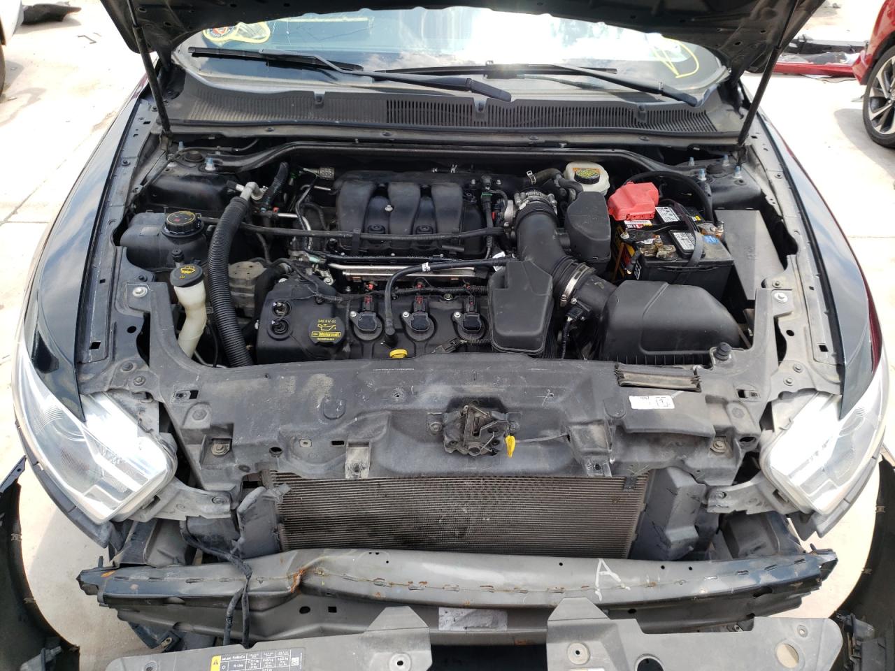 Photo 7 from auction – 2014 FORD TAURUS SEL with VIN 1FAHP2E82EG110609