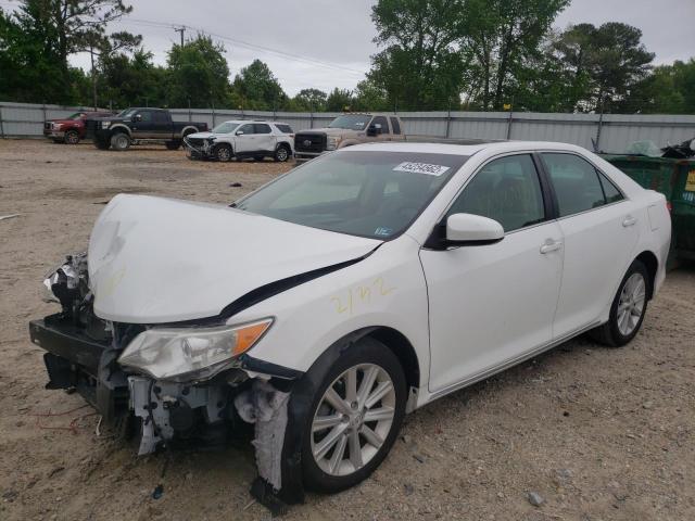 Photo 2 from auction – 2012 TOYOTA CAMRY HYBR with VIN 4T1BD1FK4CU011829