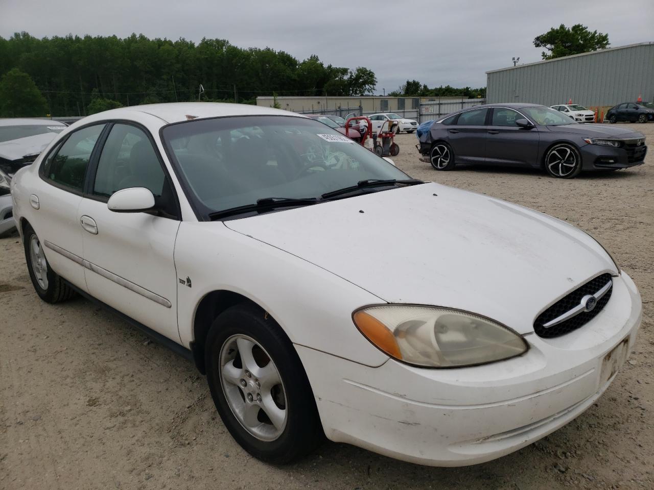 FORD TAURUS SES 2000 with VIN 1FAFP5529YA184914 - Photo from auction