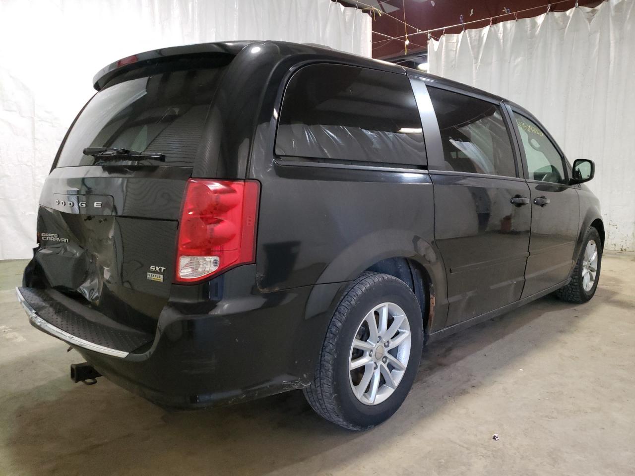 Photo 4 from auction – 2014 DODGE GRAND CARA with VIN 2C4RDGCG1ER429738
