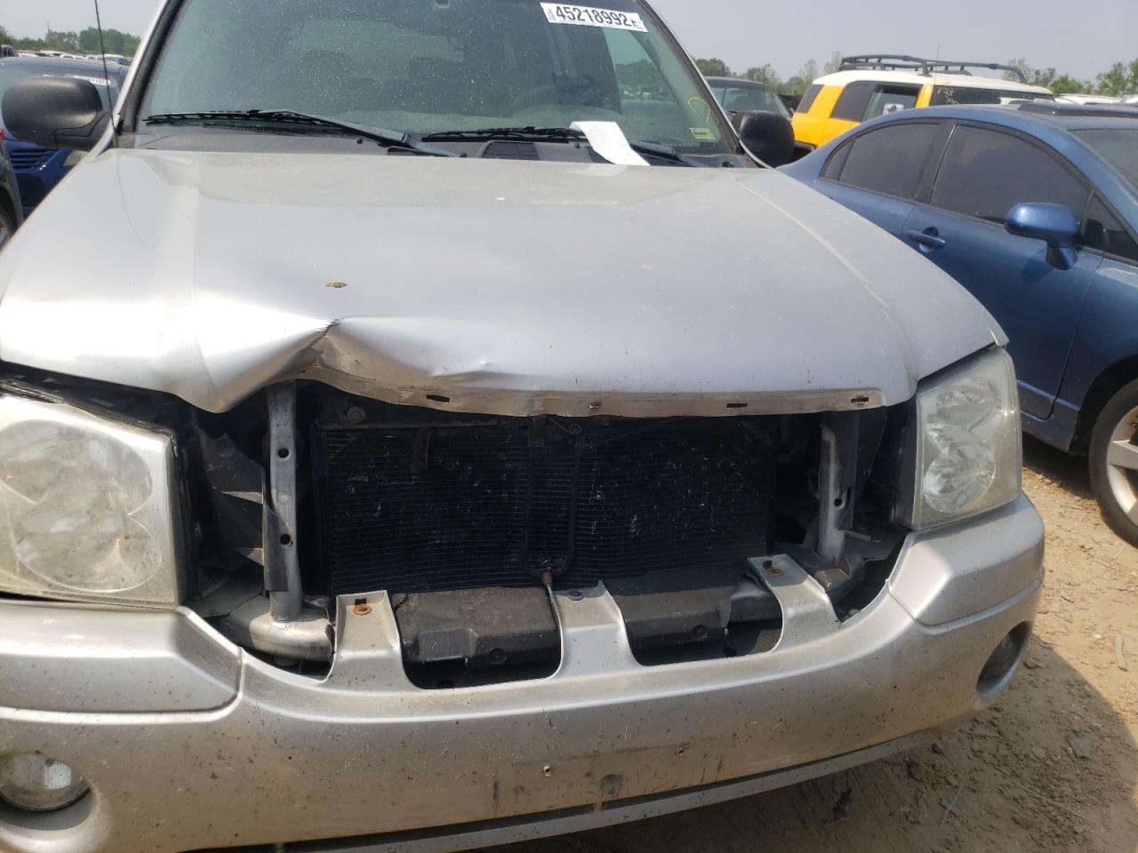 Photo 9 from auction – 2004 GMC ENVOY XL with VIN 1GKET16S446150745