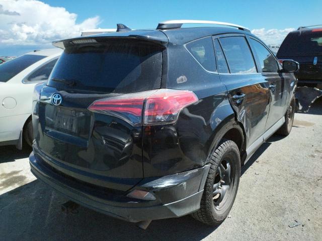 Photo 4 from auction – 2016 TOYOTA RAV4 LE with VIN 2T3BFREV9GW445455