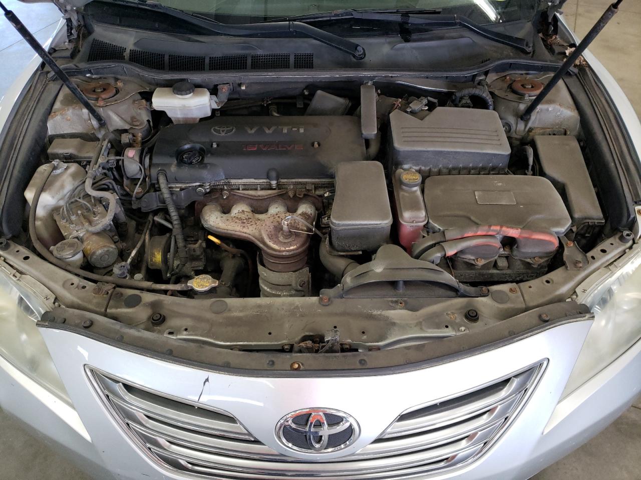 Photo 7 from auction – 2007 TOYOTA CAMRY HYBR with VIN JTNBB46K973018097