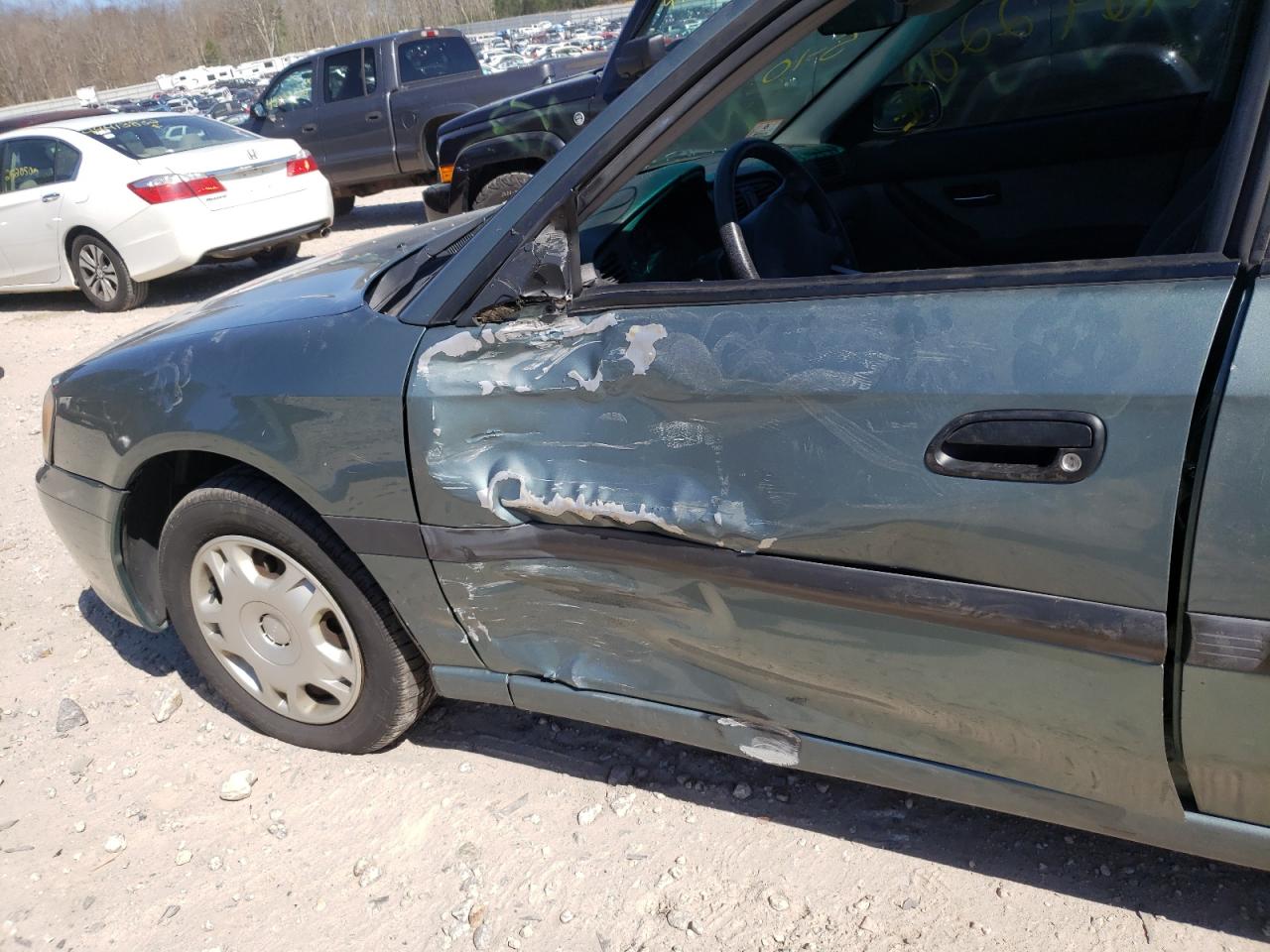 Photo 9 from auction – 2000 SUBARU LEGACY L with VIN 4S3BE6358Y7210708