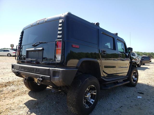 Photo 4 from auction – 2004 HUMMER H2 with VIN 5GRGN23U14H118137
