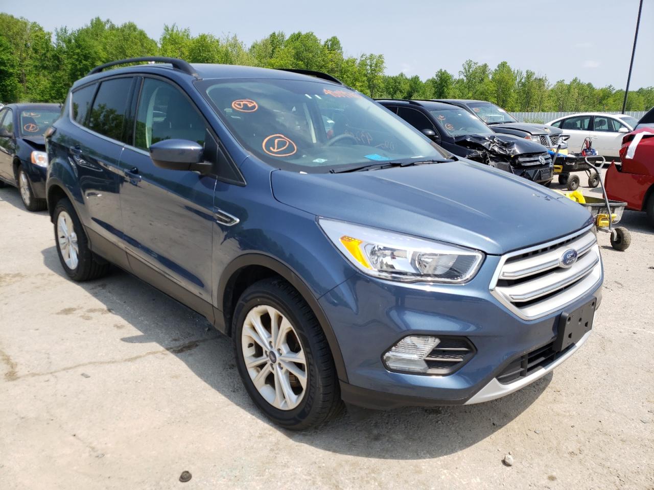 Photo 1 from auction – 2018 FORD ESCAPE SE with VIN 1FMCU9GD0JUC24244