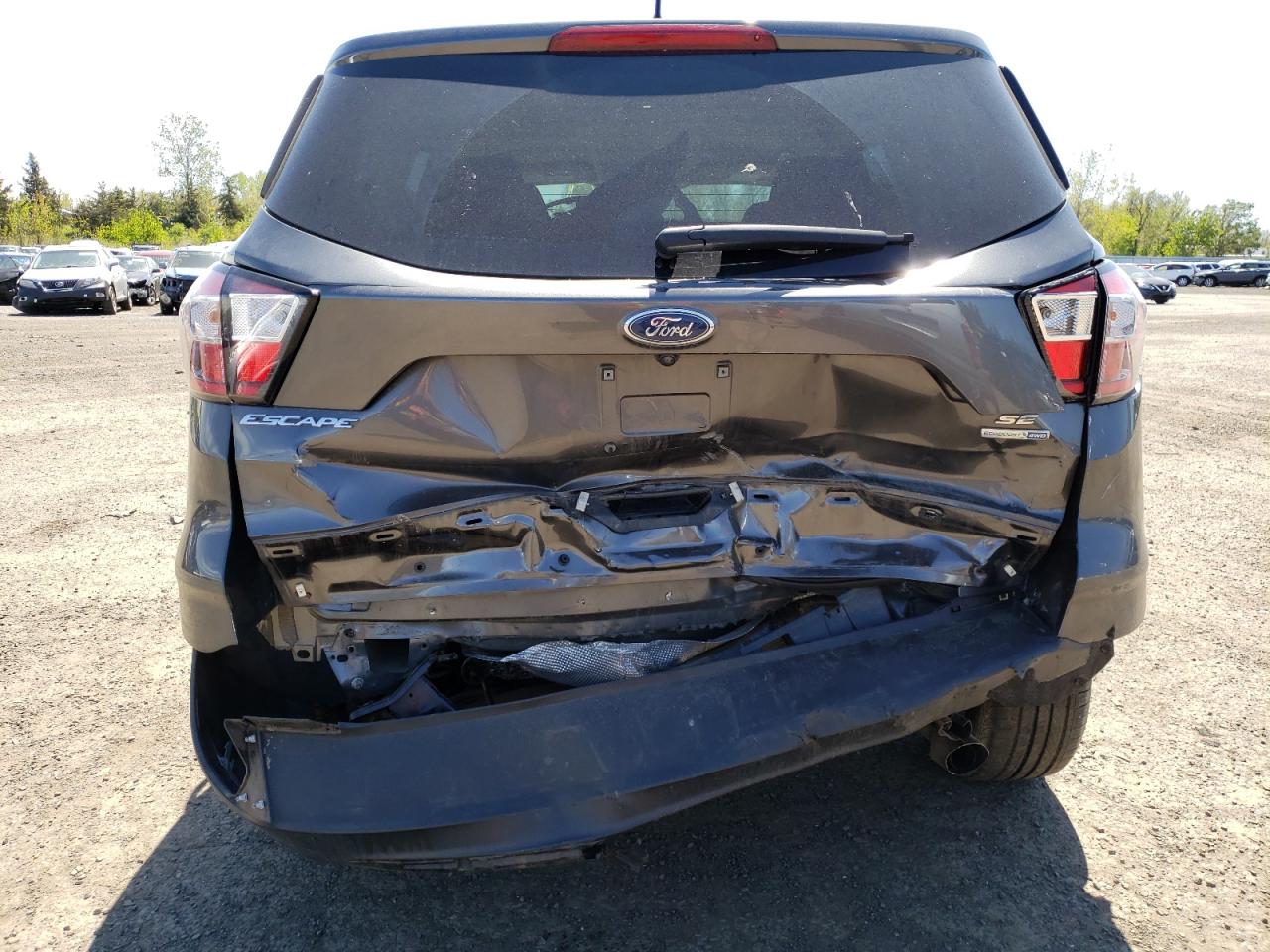Photo 9 from auction – 2018 FORD ESCAPE SE with VIN 1FMCU9GD4JUB66154