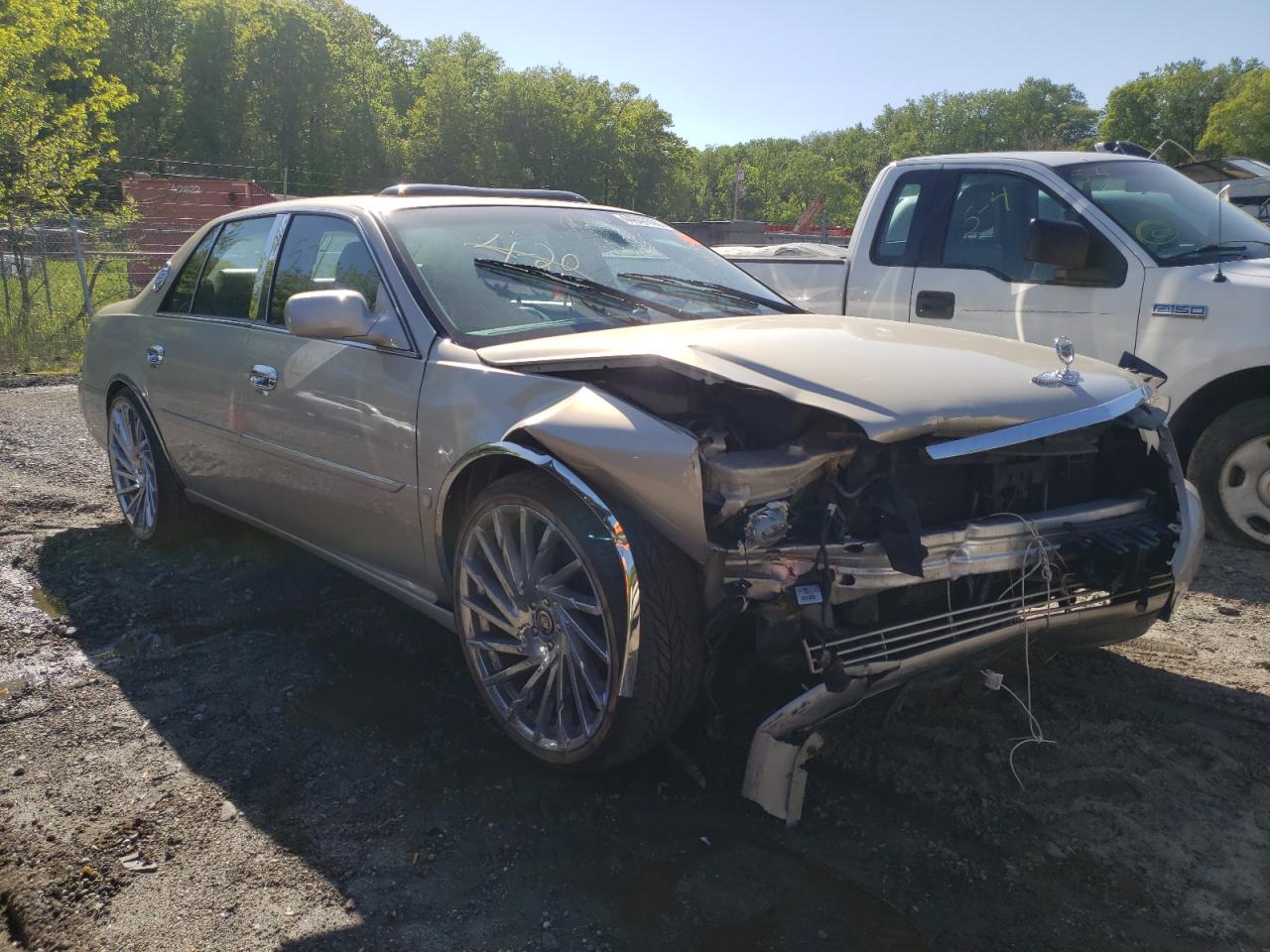 CADILLAC DTS 2009 with VIN 1G6KD57YX9U120564 - Photo from auction