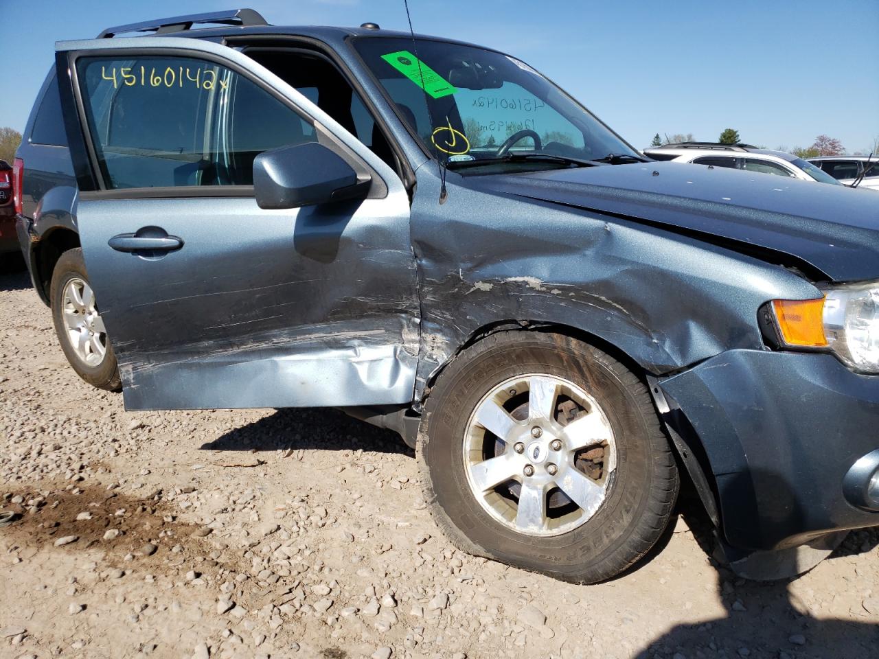 Photo 9 from auction – 2012 FORD ESCAPE LIM with VIN 1FMCU9E78CKA70474
