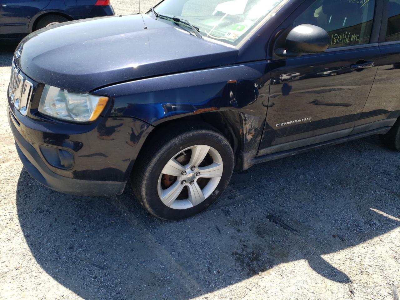 Photo 9 from auction – 2011 JEEP COMPASS SP with VIN 1J4NF1FB3BD188439