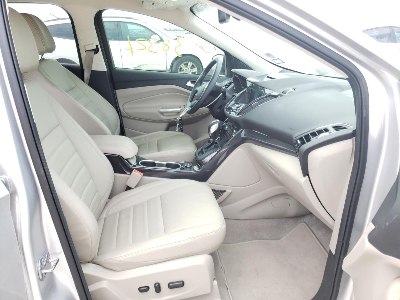 Photo 5 from auction – 2016 FORD ESCAPE TIT with VIN 1FMCU0JX3GUA66067